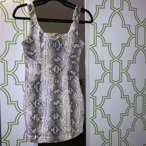 Tight snakeskin dress